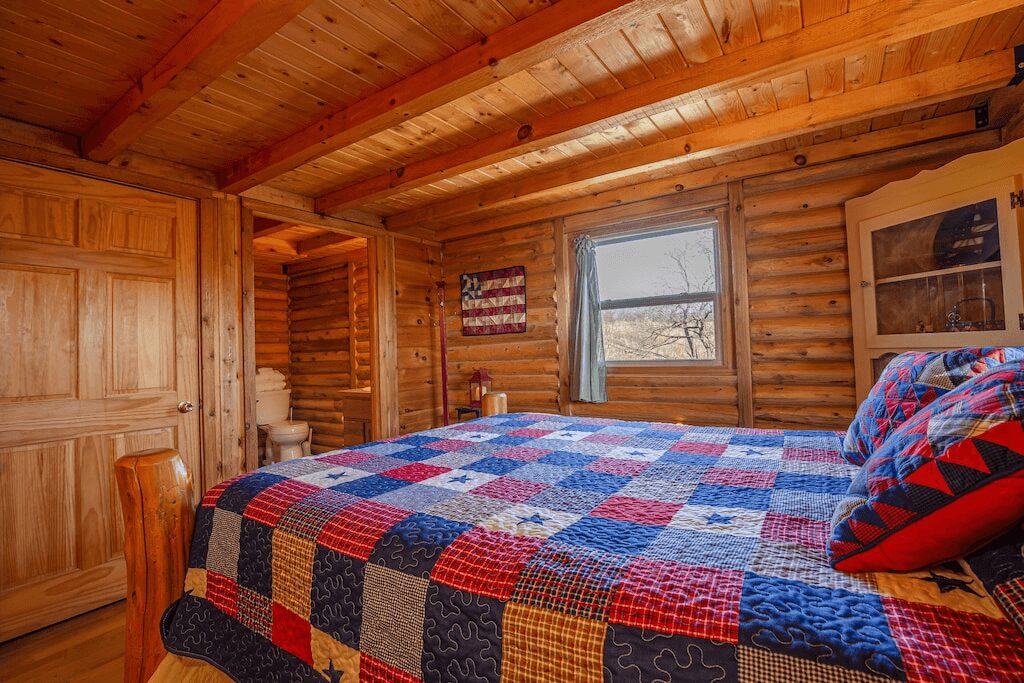 bed inside the wooden room